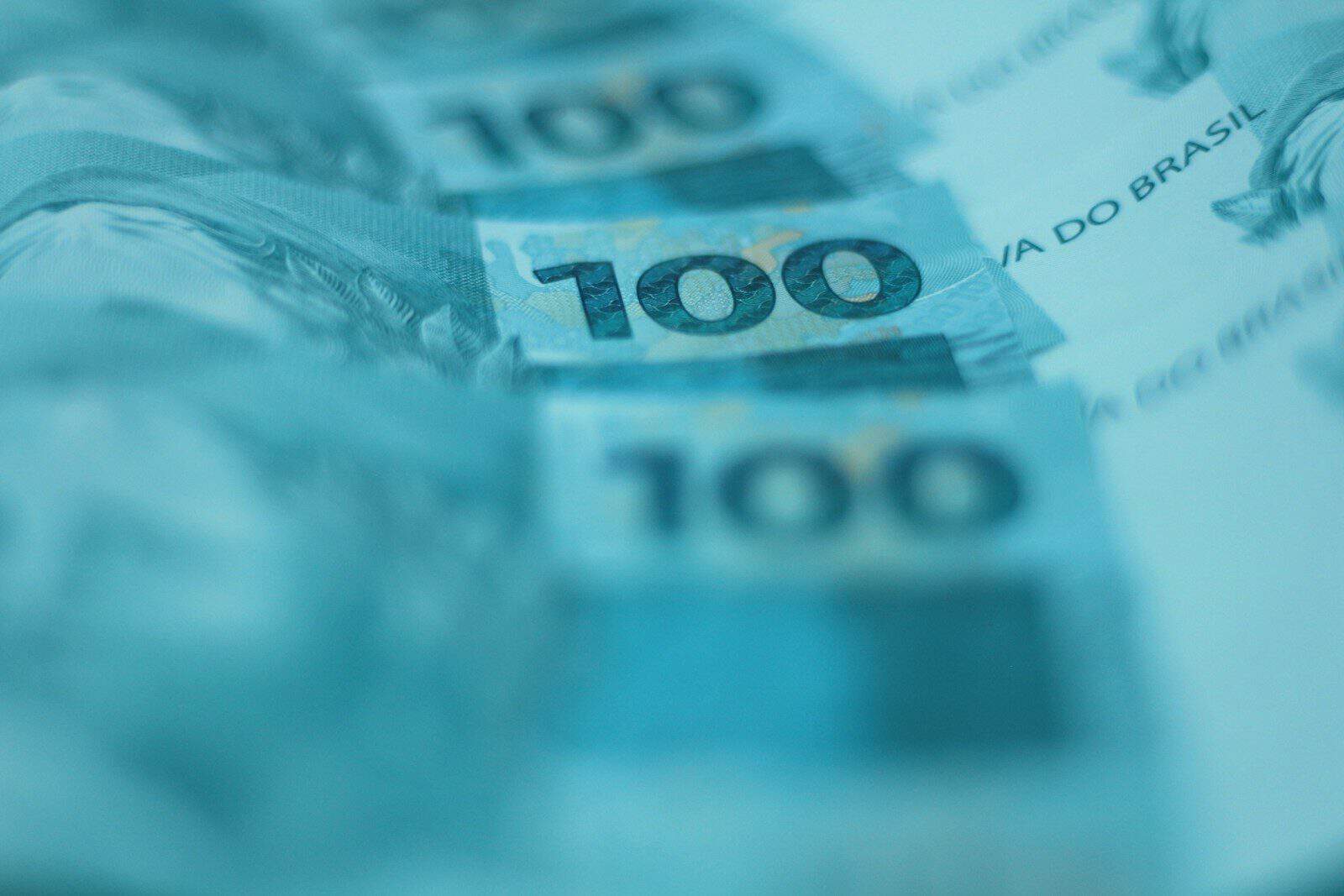 A bunch of money sitting on top of a table