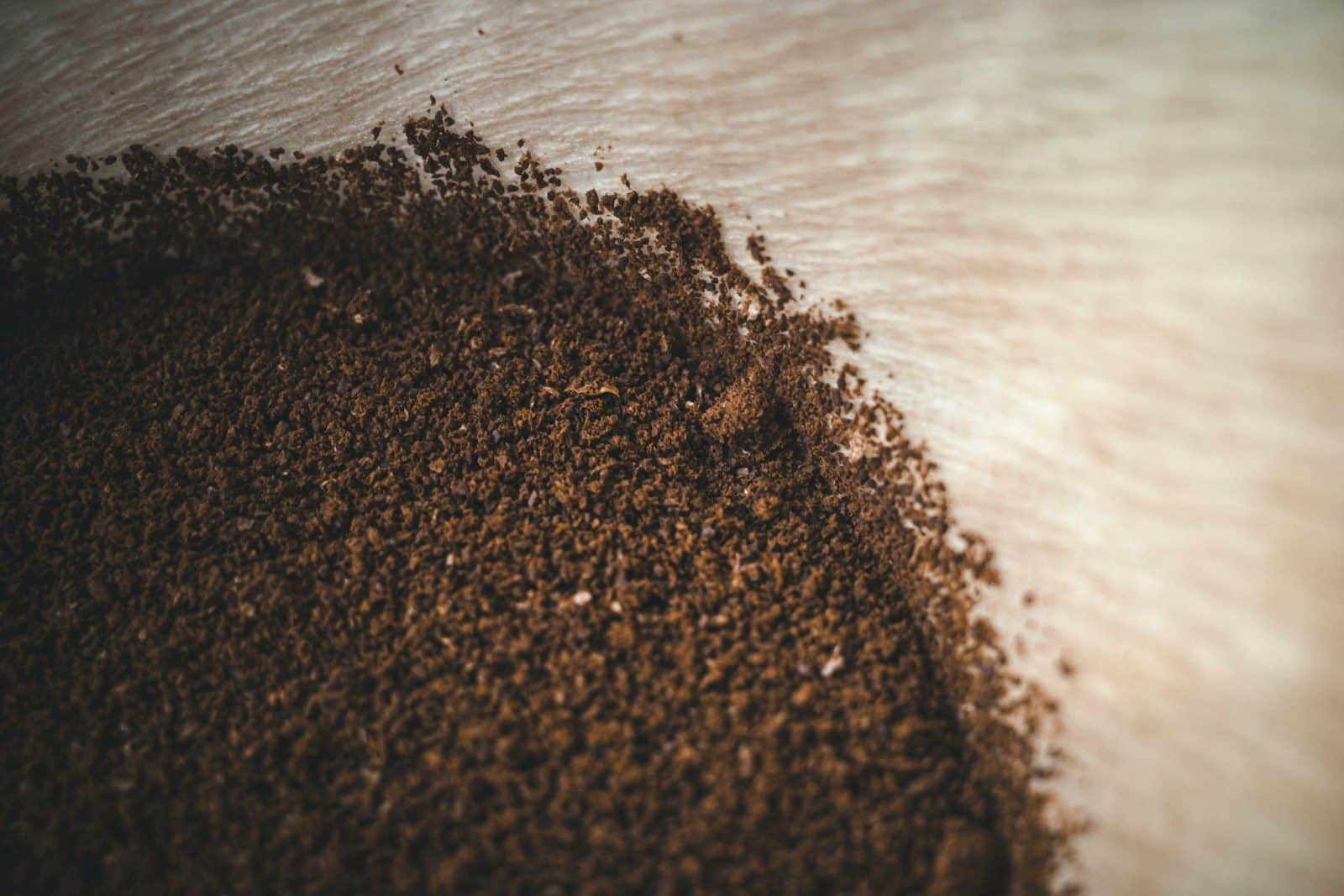brown sand on body of water